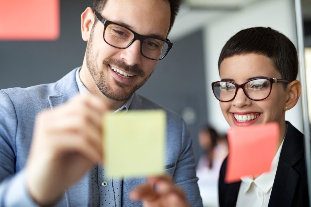 Workers with post it notes